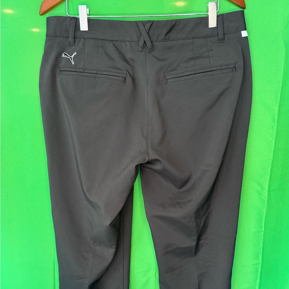 Puma Cobra flat front, straight leg, golf pants in black. Sz 12 women’s